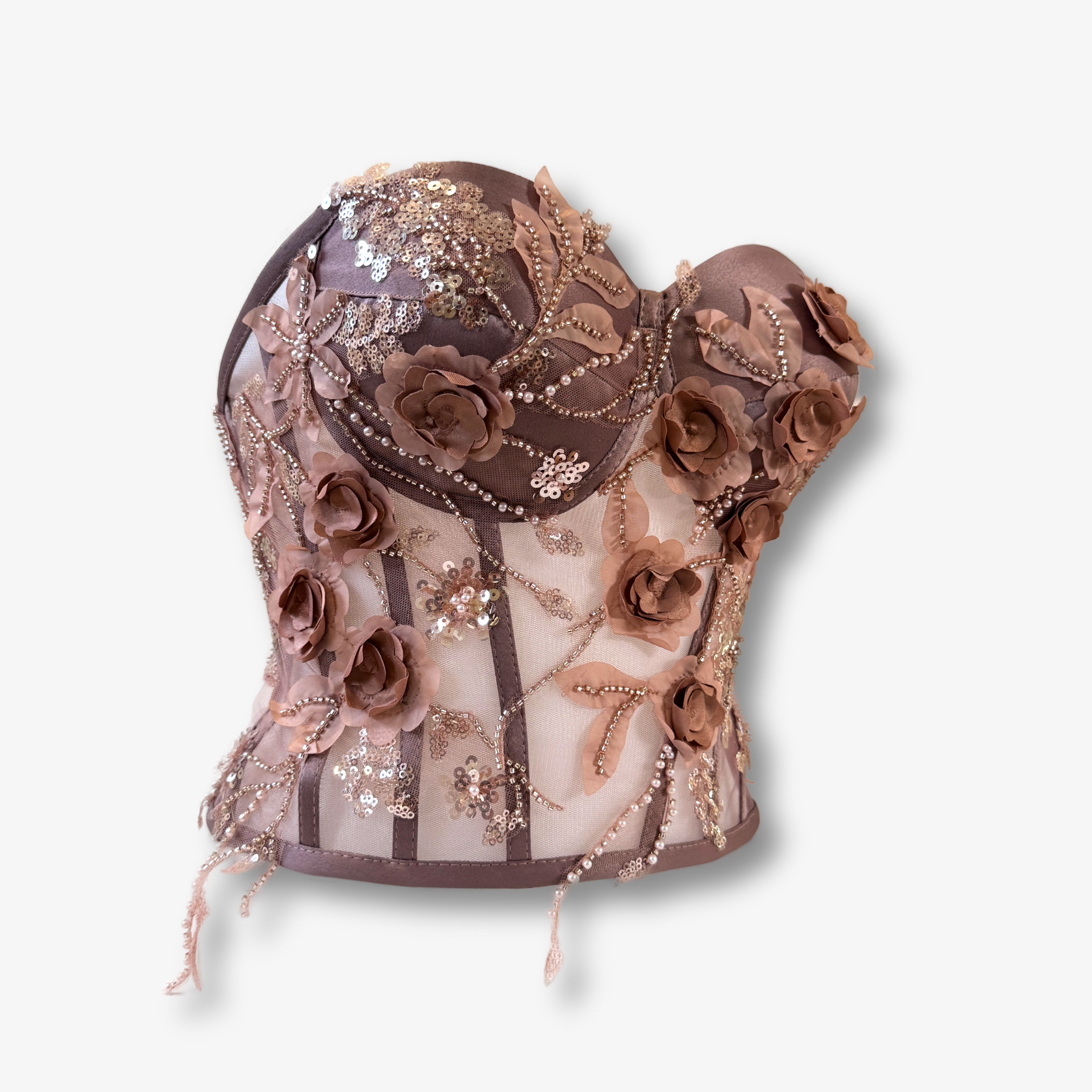 Rückansicht eines nudefarbenen Spitzenkorsetts mit transparentem Mesh und floralen Applikationen von DEFONDO.