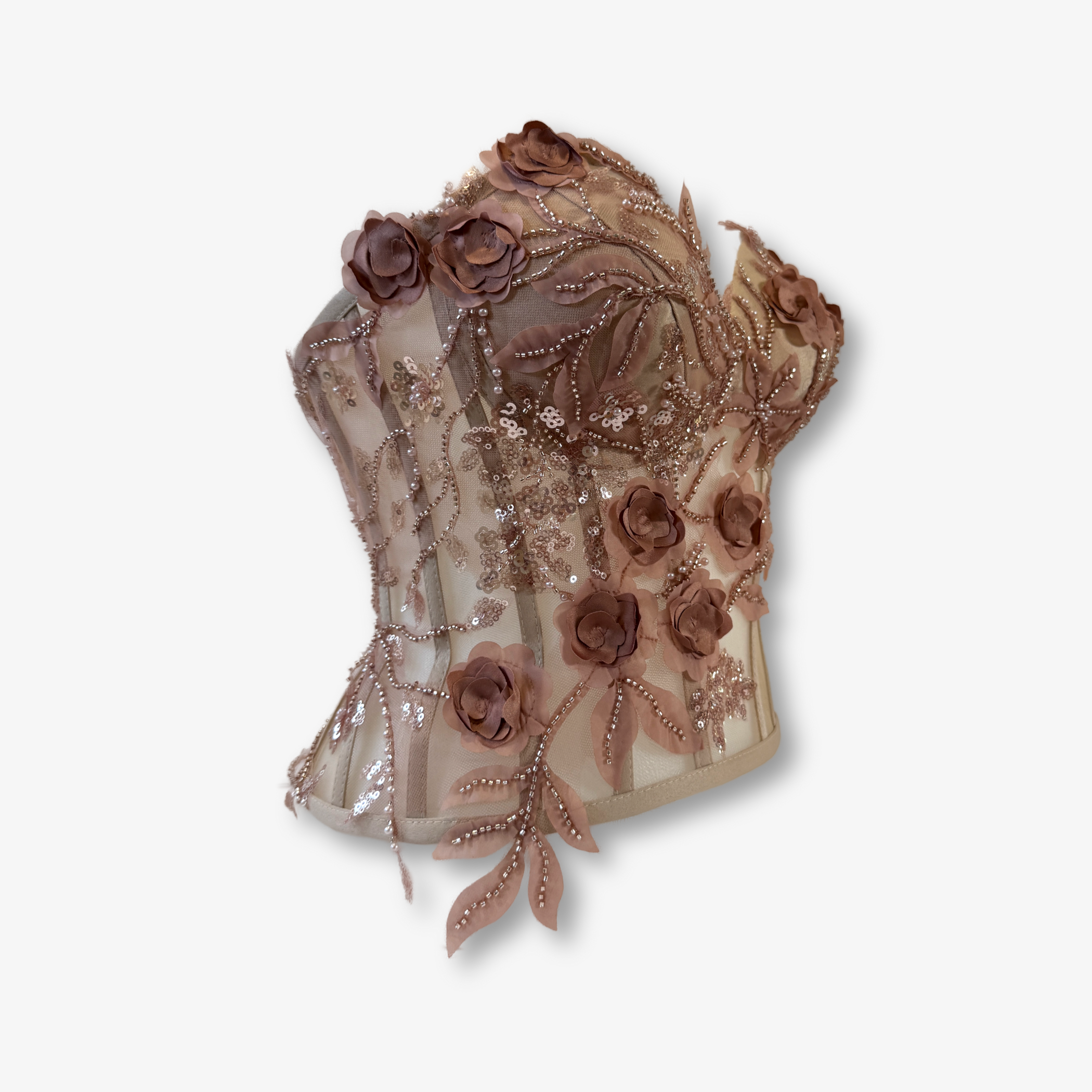 Seitenansicht eines champagnerfarbenen Spitzenkorsetts mit transparentem Mesh und floralen Applikationen von DEFONDO.